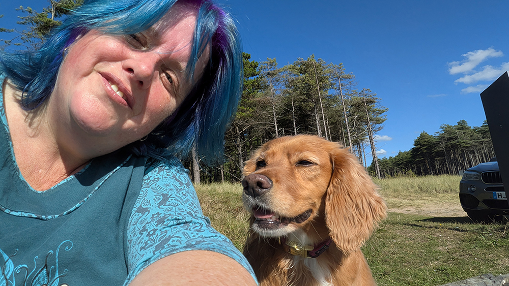 Photograph of Carleen with her dog Molly